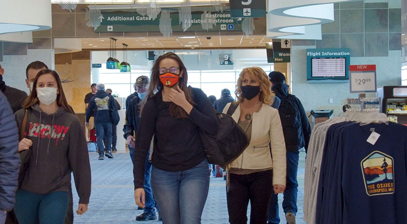 Image of people wearing masks at our airport